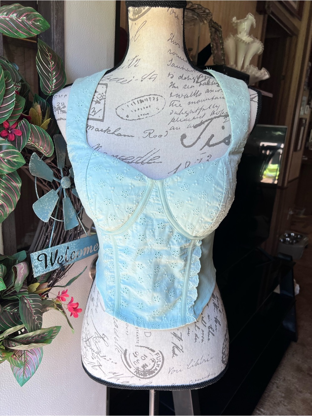 Women’s Madden NYC light blue or aqua eyelet-embroidered bustier corset top.